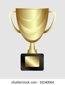 Una taza de trofeo de oro con espacio para copiar en la placa.