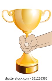 gold trophy in the hand