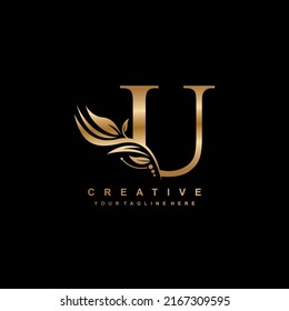 gold U letter logo design with luxurious and beautiful leaf ornament. U Monogram. U typography. gold feather logo. initial letter U logo. suitable for business logo, hotel, boutique, wedding, etc