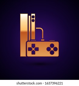 Gold Video game console with joystick icon isolated on dark blue background.  Vector Illustration