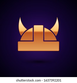 Gold Viking in horned helmet icon isolated on dark blue background.  Vector Illustration