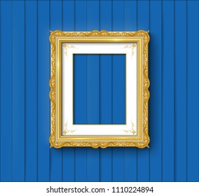gold vintage frame on blue wall 