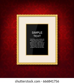Gold vintage picture frame on red wall 