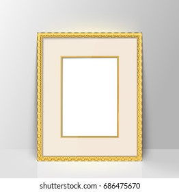 gold vintage  picture frame on floor 