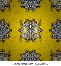 Gold Wallpaper on texture background.Damask pattern repeating background. Gold yellow floral ornament in baroque style. Golden element on yellow background.