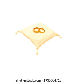 Gold wedding rings on white pillow with tassels isolated. Vector wedding salon emblem, royal soft pillow with jewelry symbol of love, matrimony and proposal. Pair of gold shiny rings, expensive gift