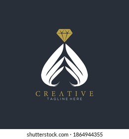 Gold and white luxury wings diamond and jewel design vector logo illustration and black background