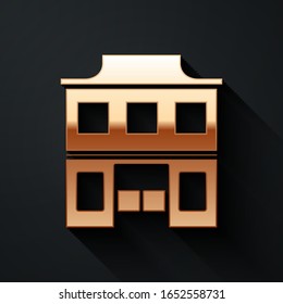 Gold Wild west saloon icon isolated on black background. Old west building. Long shadow style. Vector Illustration