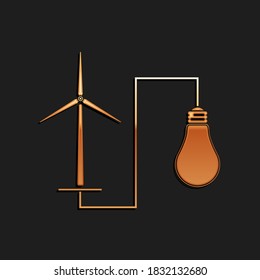 Gold Wind mill turbine generating power energy and bulb icon isolated on black background. Natural renewable energy production using wind mills. Long shadow style. Vector.