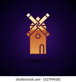 Gold Windmill icon isolated on dark blue background.  Vector Illustration