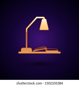 Gold Workplace with table lamp and open book icon isolated on dark blue background. Table office lamp.  Vector Illustration