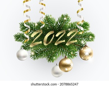 Golden 2022 text on the fur-tree branches. new year