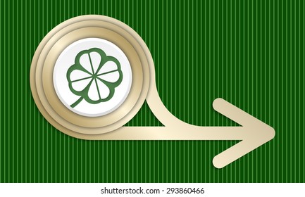 Golden abstract arrow and green cloverleaf