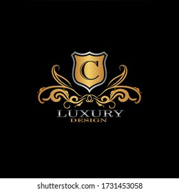 Golden Abstract Luxury Letter C Logo Icon. Vintage design logo icon concept letter C on shield for luxuries business.