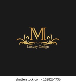 Golden Abstract Luxury letter M logo icon design concept.

