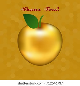 A golden apple on a background of honey in honeycombs. Shana Tova - Happy New Year (hebrew)