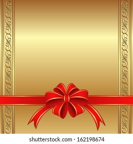 golden background with a red bow for gifts