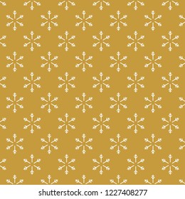 Golden background with snowflakes. Seamless texture