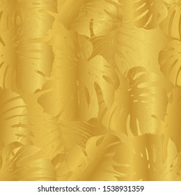 Golden background from tropical leaves. Monstera Leaves. Holographic effect. Tropics. Print for fabric, paper, wallpaper.