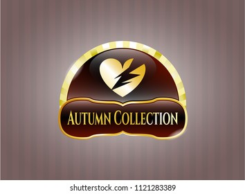  Golden badge with broken heart icon and Autumn Collection text inside