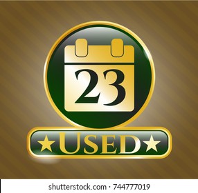  Golden badge with calendar icon and Used text inside