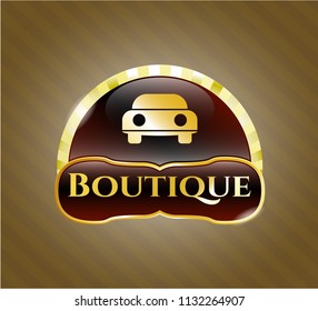  Golden badge with car seen from front icon and Boutique text inside