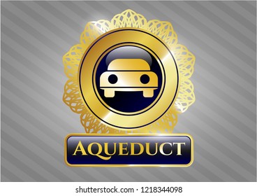   Golden badge with car seen from front icon and Aqueduct text inside