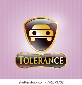  Golden badge with car seen from front icon and Tolerance text inside