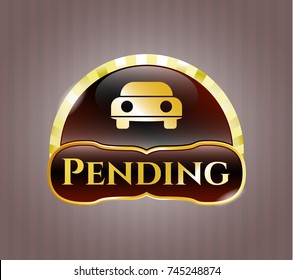  Golden badge with car seen from front icon and Pending text inside