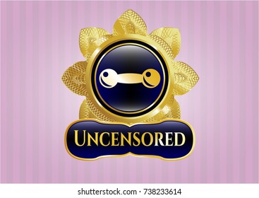  Golden badge with dumbbell icon and Uncensored text inside