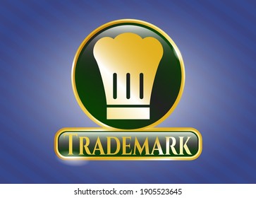 Golden badge or emblem with chef hat icon and Trademark text inside