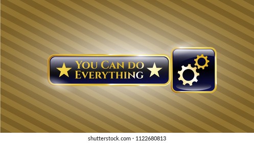  Golden badge with gear, team work icon and You Can do Everything text inside