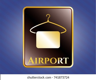  Golden badge with hanger with towel icon and Airport text inside