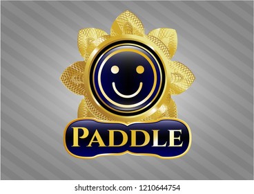  Golden badge with happy face icon and Paddle text inside