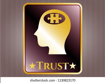  Golden badge with head with jigsaw puzzle piece icon and Trust text inside