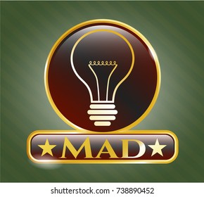  Golden badge with idea icon and Mad text inside