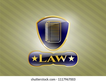  Golden badge with note book icon and Law text inside