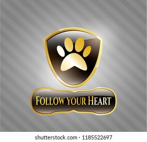  Golden badge with paw icon and Follow your Heart text inside