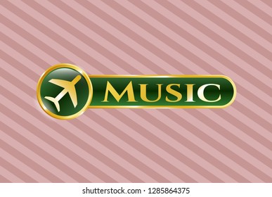  Golden badge with plane icon and Music text inside