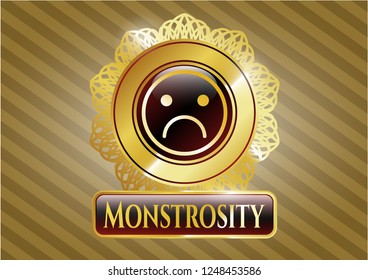  Golden badge with sad face icon and Monstrosity text inside
