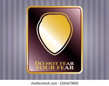  Golden badge with shield icon and Do not fear your fear text inside