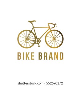 Golden Bike logo design. Logotype of bicycle  icon