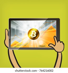 Golden bitcoin cryptocurrency in the bright rays on background with statistics chart showing various visualization on the screen of tablet