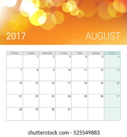 Golden bokeh august 2017 calendar, weeks start on monday
