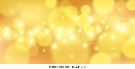 Golden bokeh background. Christmas glowing lights with sparkles. Holiday decorative effect.