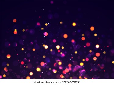 Golden bokeh lights on purple background.