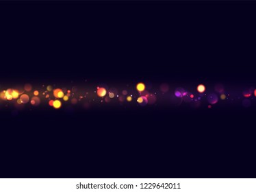 Golden bokeh lights on purple background.