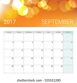 Golden bokeh september 2017 calendar, weeks start on monday