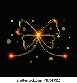 Golden bow on a black background