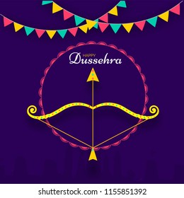 Golden Bow-Arrow on blue background decorated with colorful party flag for Dussehra festival celebration concept.